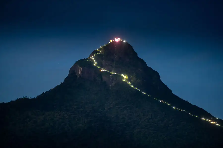 Steep, illuminated steps leading up Adam's Peak