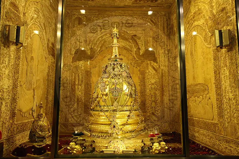 Interior view of the Temple of the Tooth Relic during a Pooja